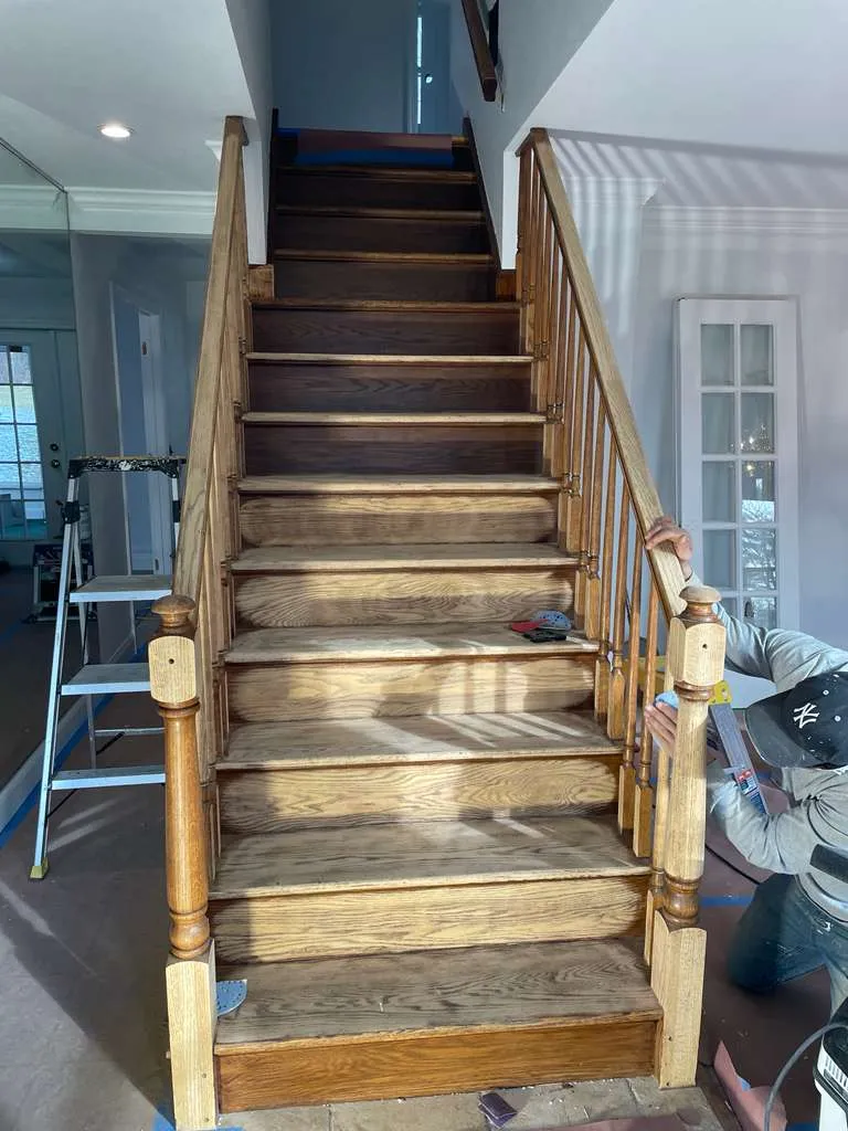 Professional painting contractor working on Connecticut home
